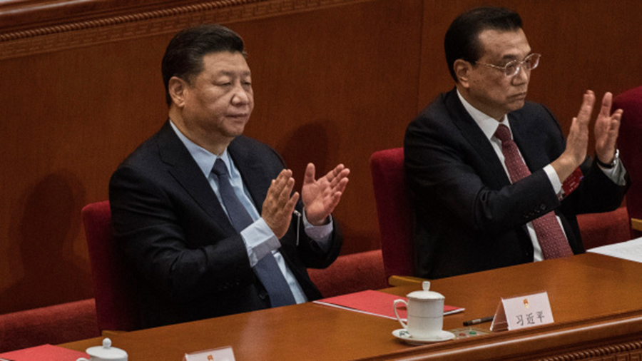 2019年3月15日全国人大会议闭幕会上的习近平和李克强（图片来源:Kevin Frayer/Getty Images）
