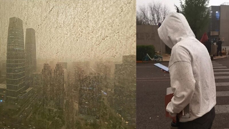 北京再遭沙尘暴袭击 泥雨让人遭殃