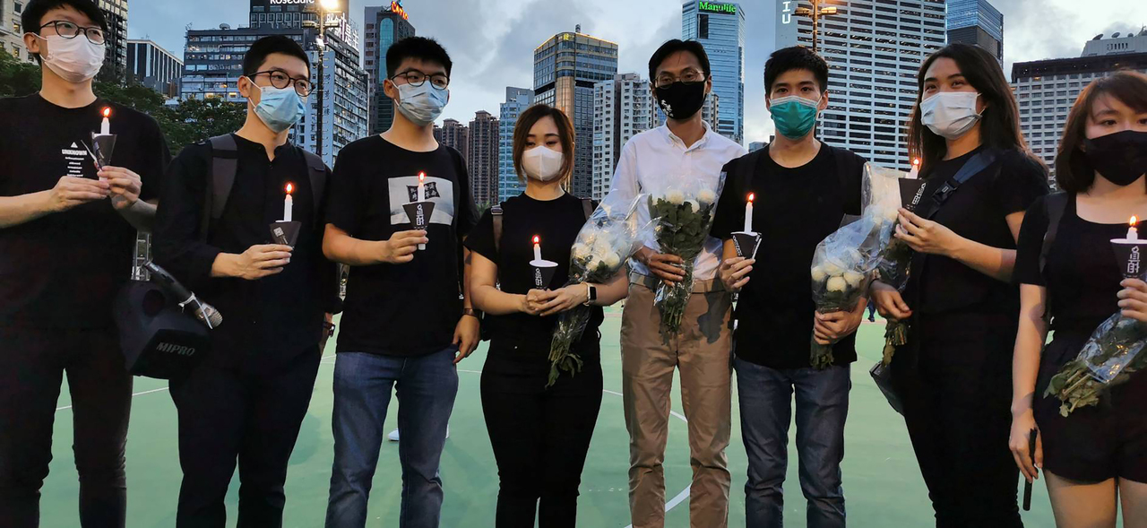 20多名香港泛民主派人士去年参加未经批准举办的“六四”烛光晚会后遭起诉