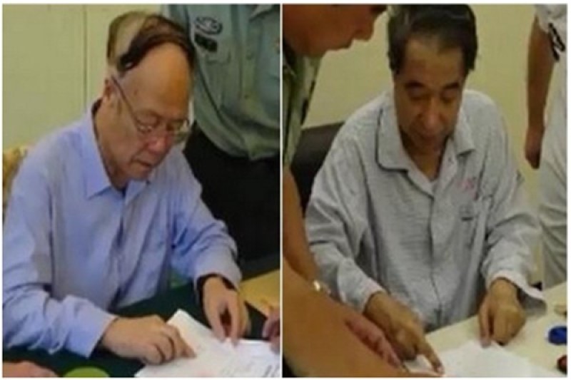 中共中央军委副主席郭伯雄（左）徐才厚（右）落马时画面