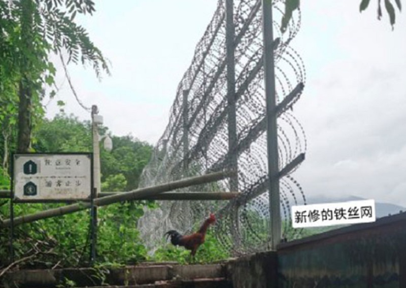 中缅边境，铁丝网隔离墙
