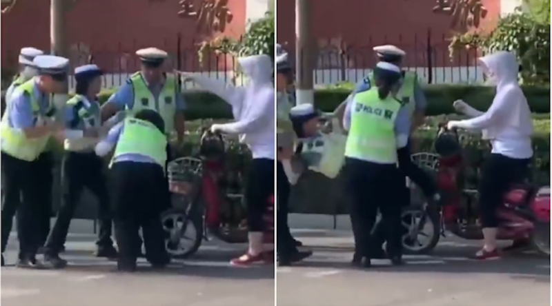 山东女辅警执法时与市民发生冲突。